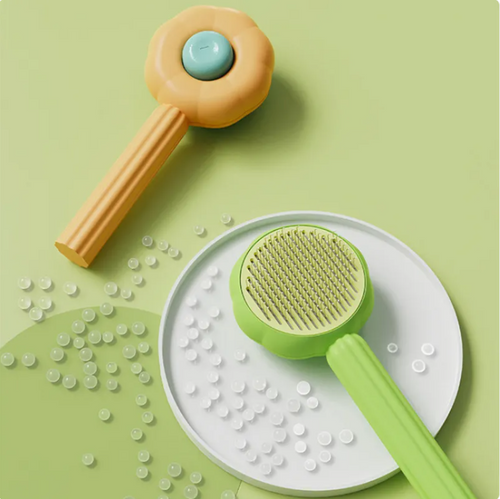 Nuzzl deshedding brush collecting loose pet fur